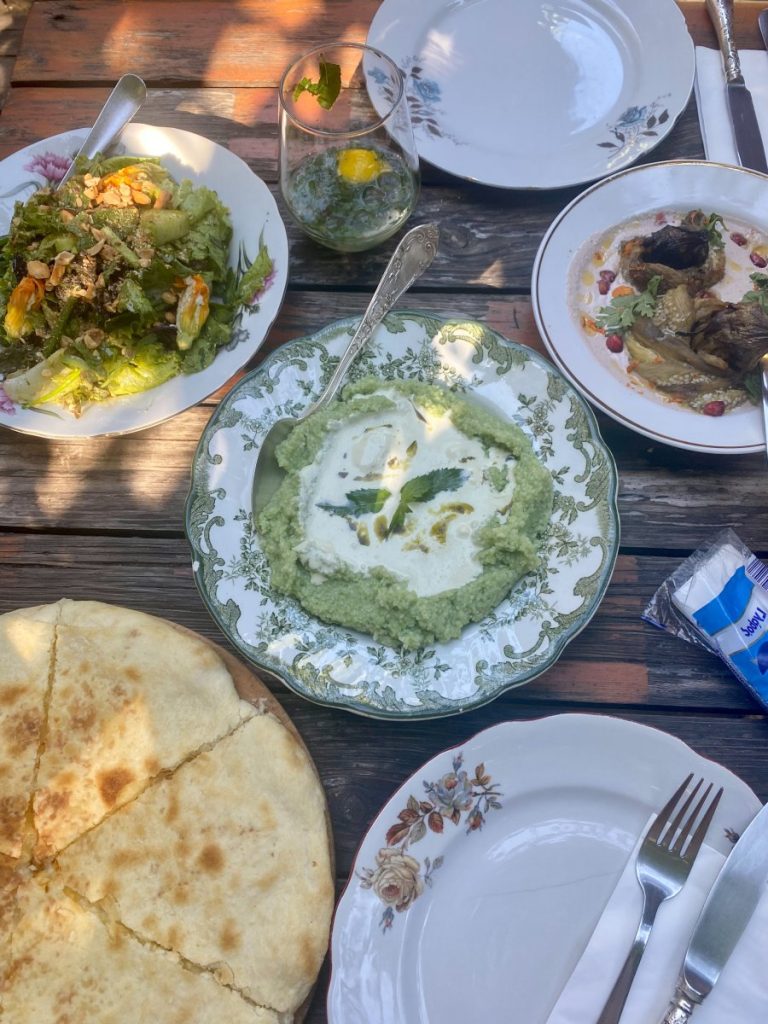 A table with plates of food on it in Tbilisi.