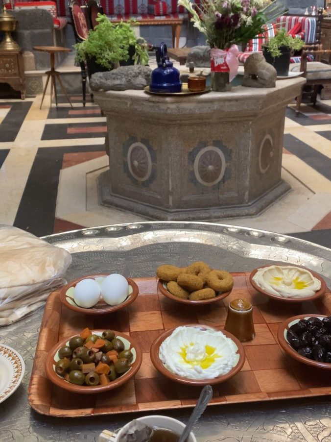 A traditional Syrian breakfast at our hotel in Damascus. Falafel, eggs, yoghurt and much more