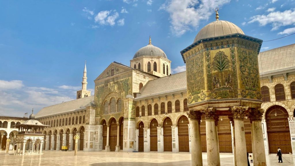 The courtyard of the Umayyad mosque, with its golden decorations.