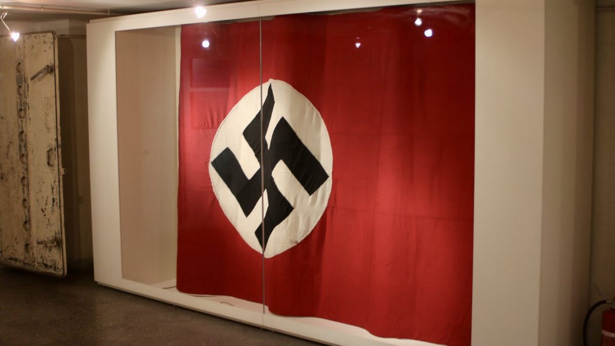  The nazi flag that stands inside the memorial site. It was on the top of the building and is now exibited in the museum