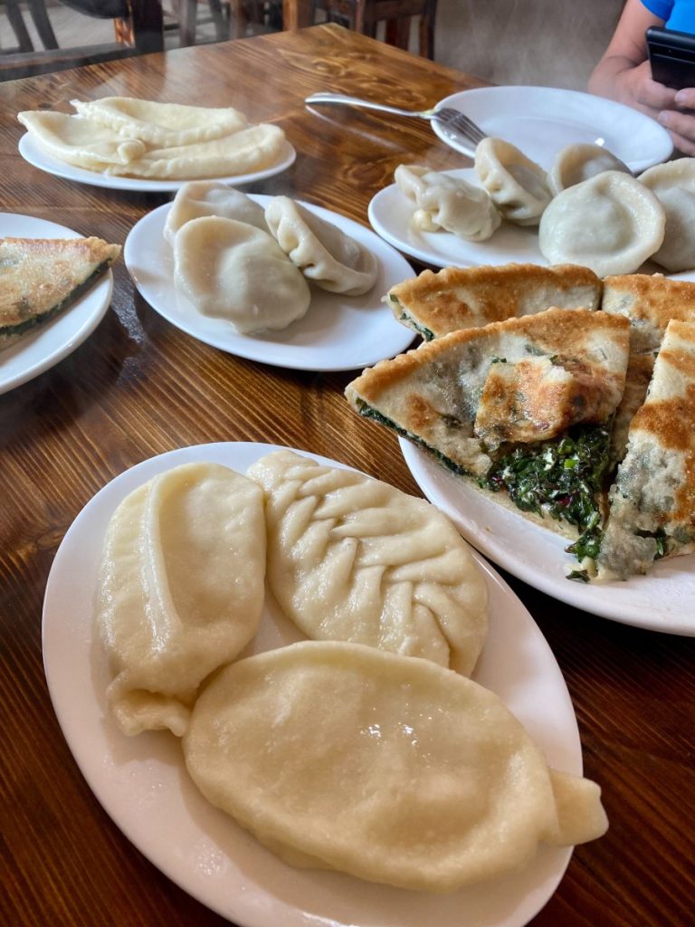 A delicious meal at Pasanauri along the georgian military highway. It consists of Khinkali, the beloved Georgian dumplings, and Mkhlovani, a pastry made of greens
