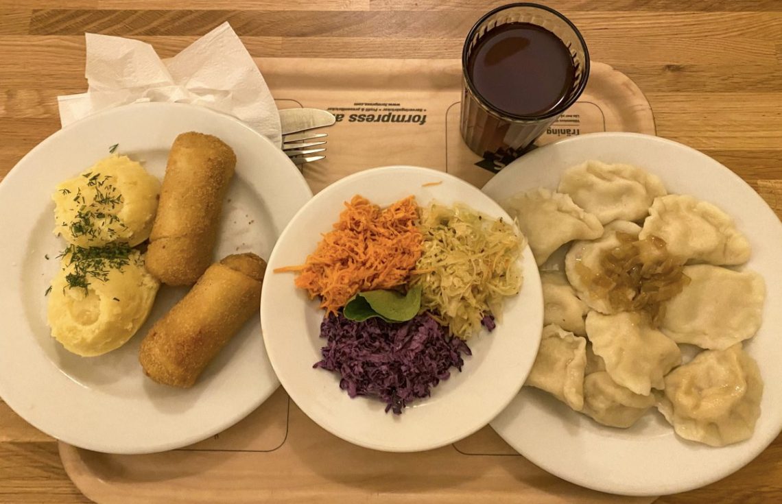 Traditional Polish food from a milk bar. It includes a salat with carrot and cabbage, fried potato sticks and pierogi. I had there some of the best foot in Krakow. Thus, I decided to put it in my Krakow food tour guide