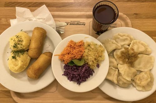 Traditional Polish food from a milk bar. It includes a salat with carrot and cabbage, fried potato sticks and pierogi. I had there some of the best foot in Krakow. Thus, I decided to put it in my Krakow food tour guide