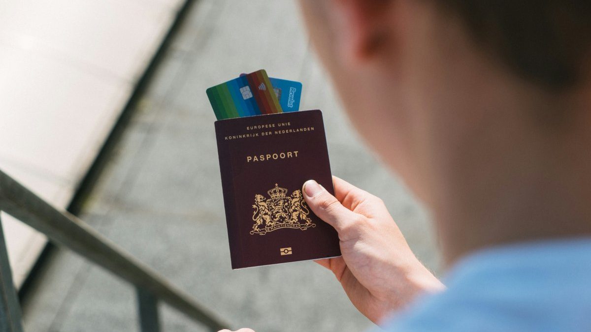 A passport that holds a revolut card
