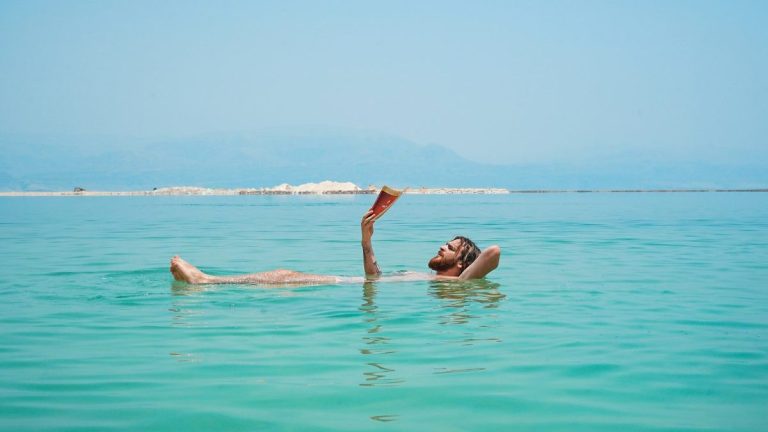A person floating in the Dead Sea, Jordan