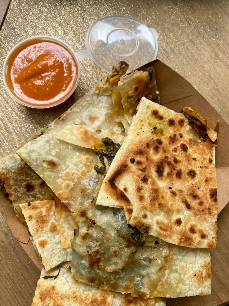 Gözleme with greens, a Turkish, crispy, and stuffed flatbread from Magic Kitchen of Exarcheia
