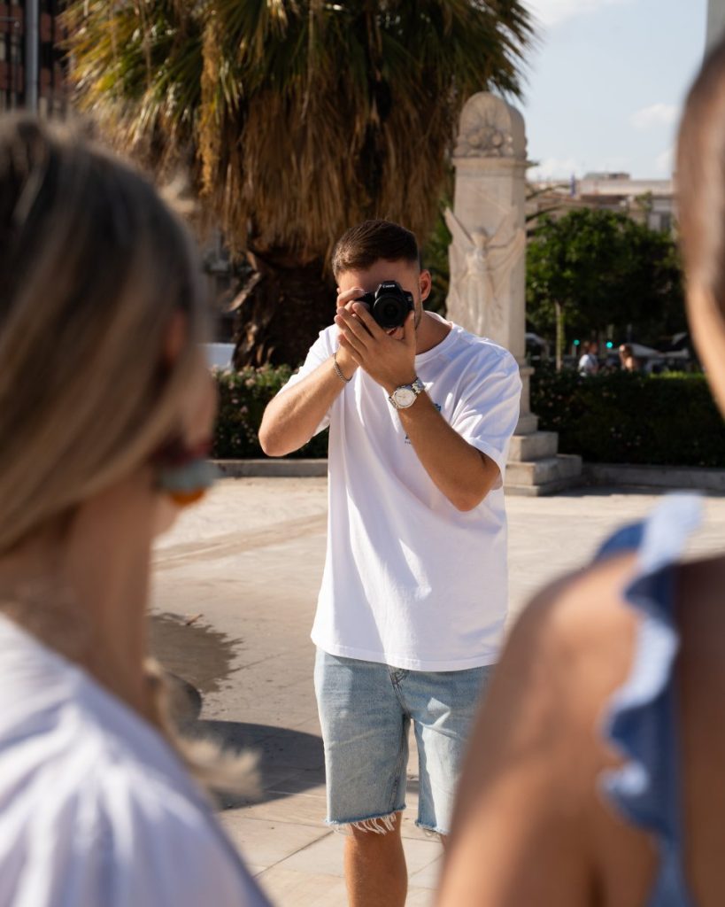 a photographer taking photos in athens