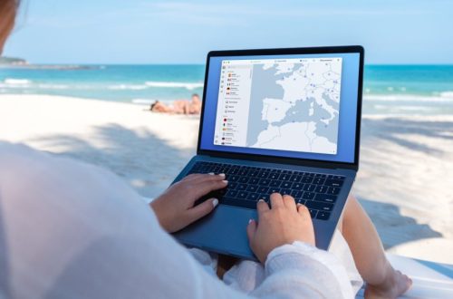 a woman in the Beach Using Nord VPN while traveling
