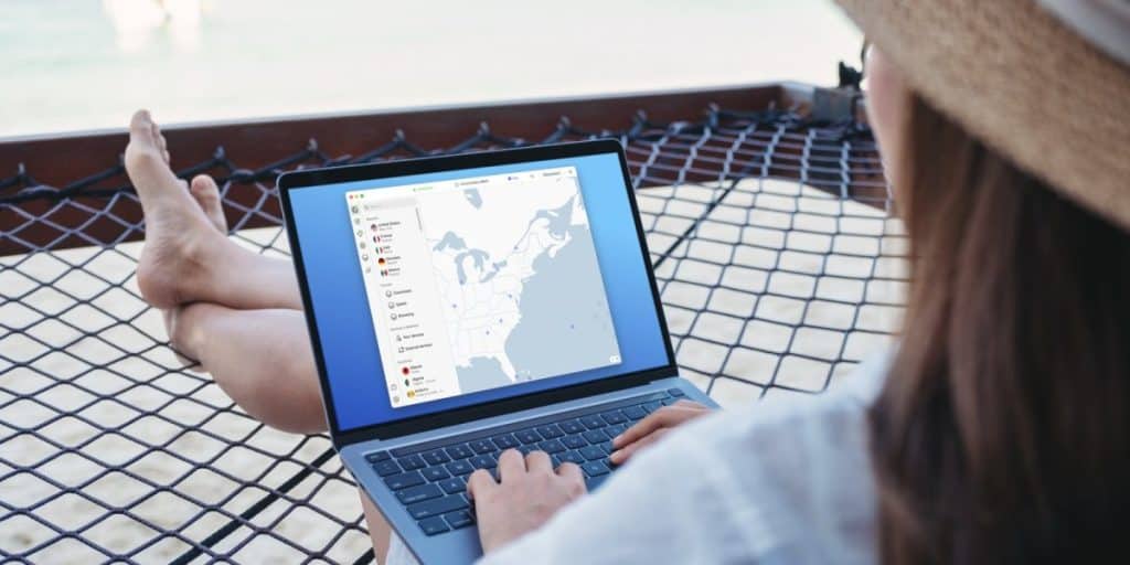 A woman sitting in her holidays and setting up VPN